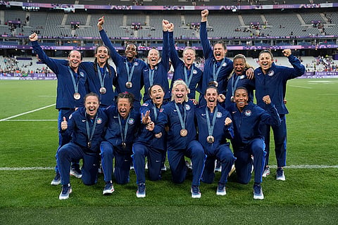Women's Rugby Sevens: United States team celebrate with their bronze medal